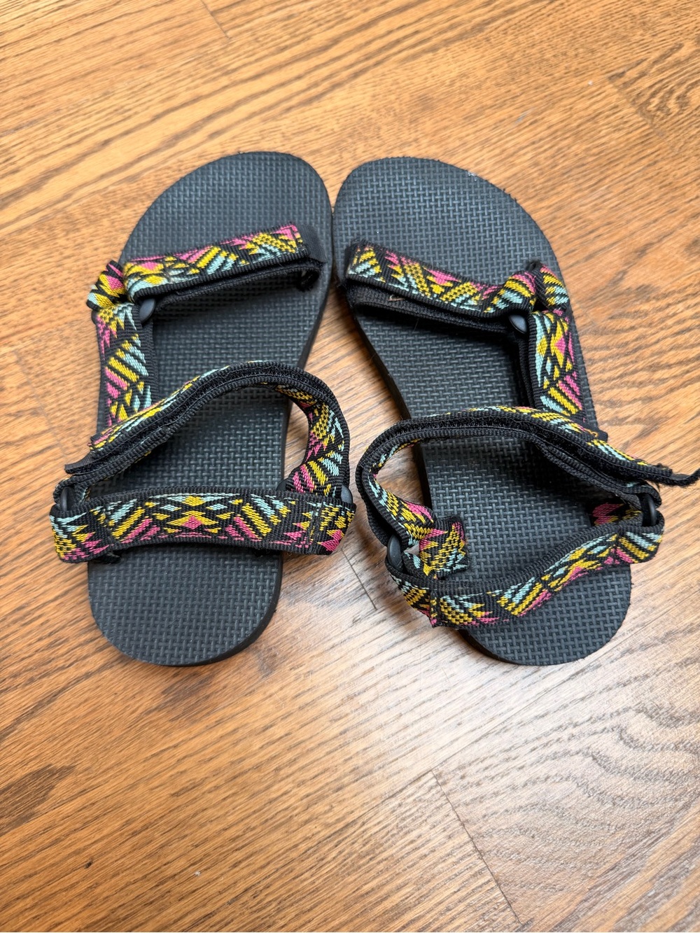 Teva Black Sandals with Yellow, Pink & Teal Patterned Straps Kids 1
